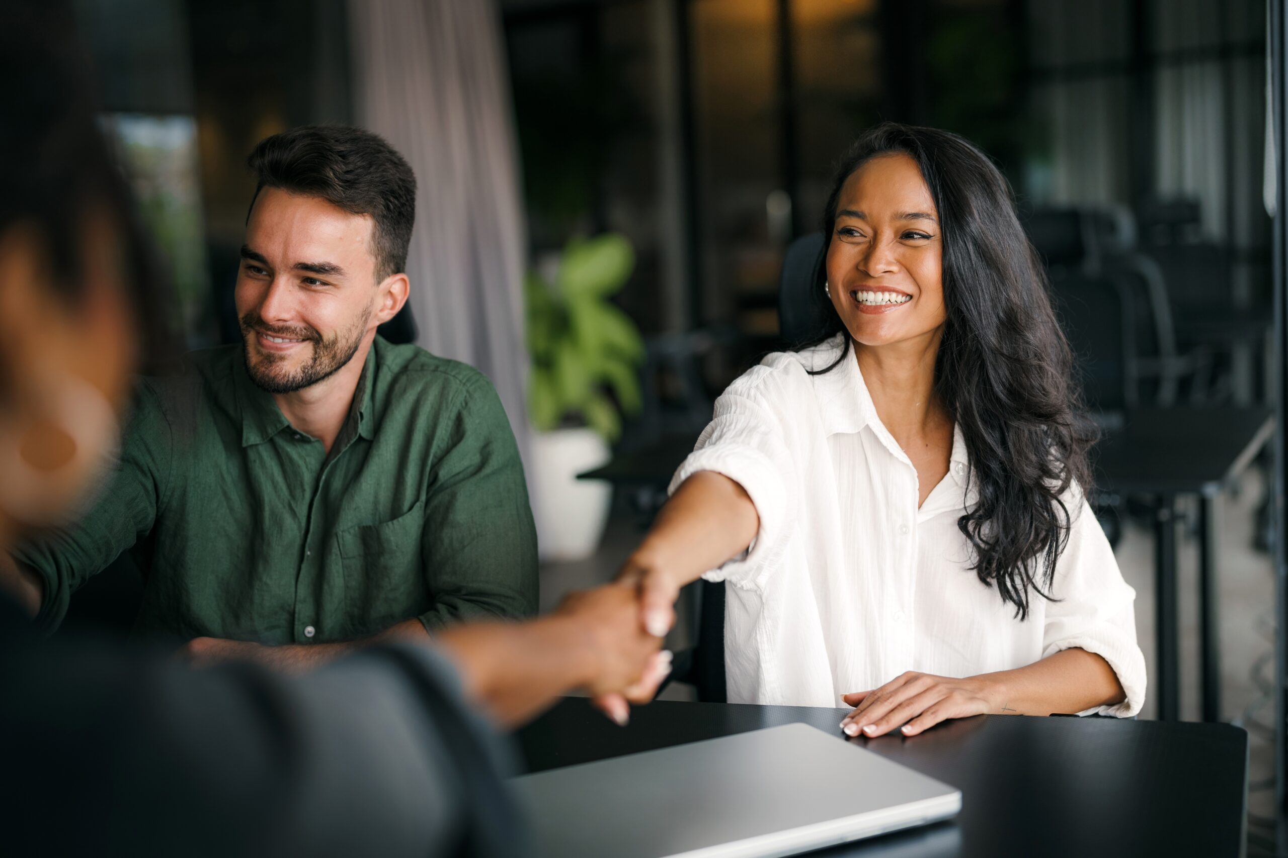 Handshake,Of,Happy,Young,Business,Woman,And,Business,Man,At